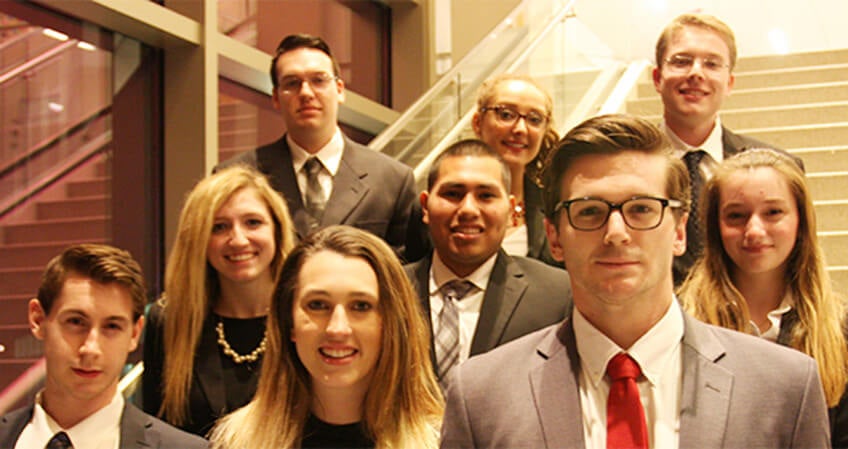 moot court students pose on stairway