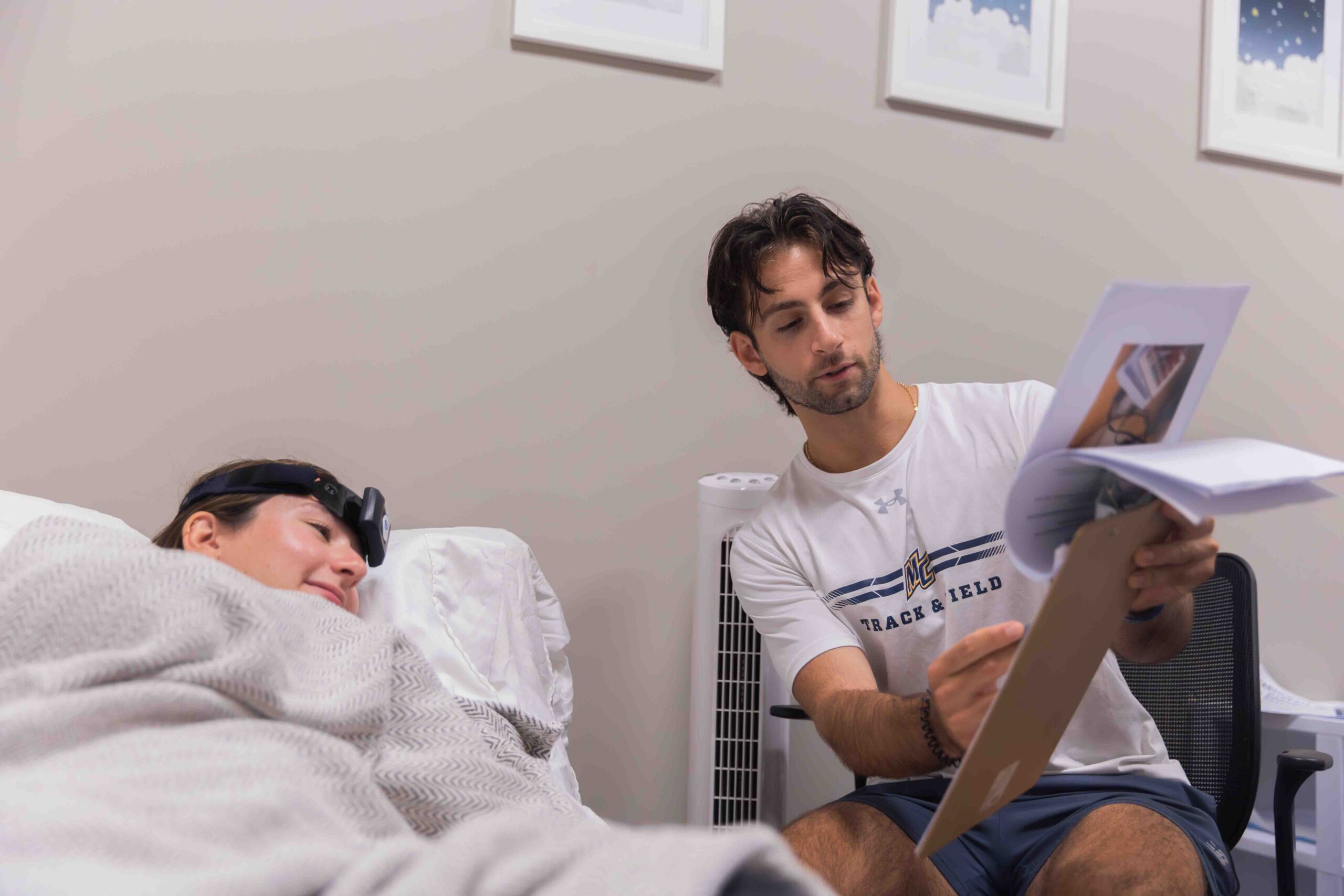 Psychology students working together in the sleep lab