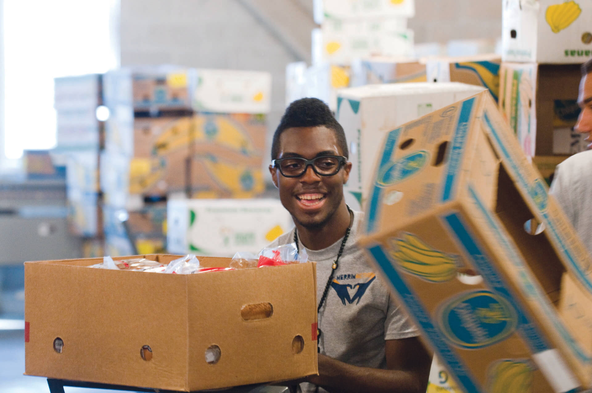 Merrimack College students volunteer at the Greater Boston Food Bank in Dorchester, MA Friday September 2, 2011.