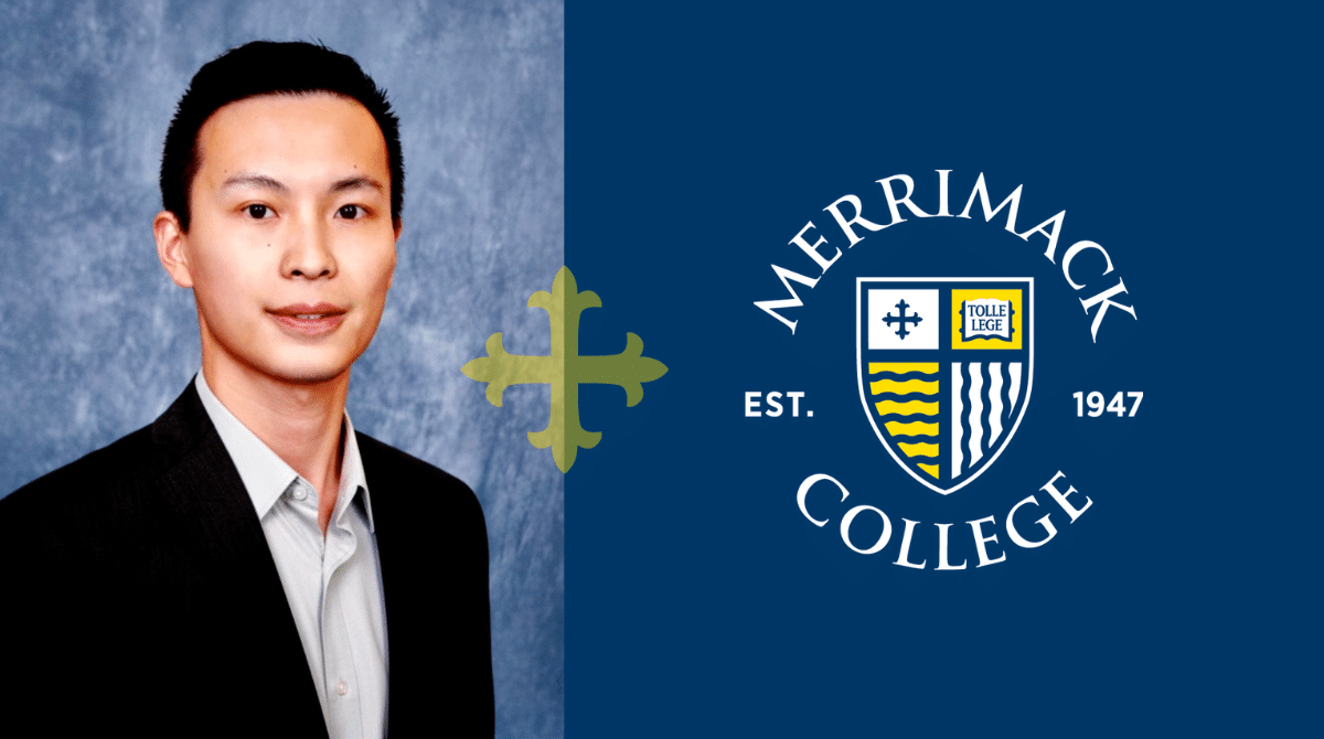Professional headshot of a man in a suit beside the Merrimack College logo on a blue background.