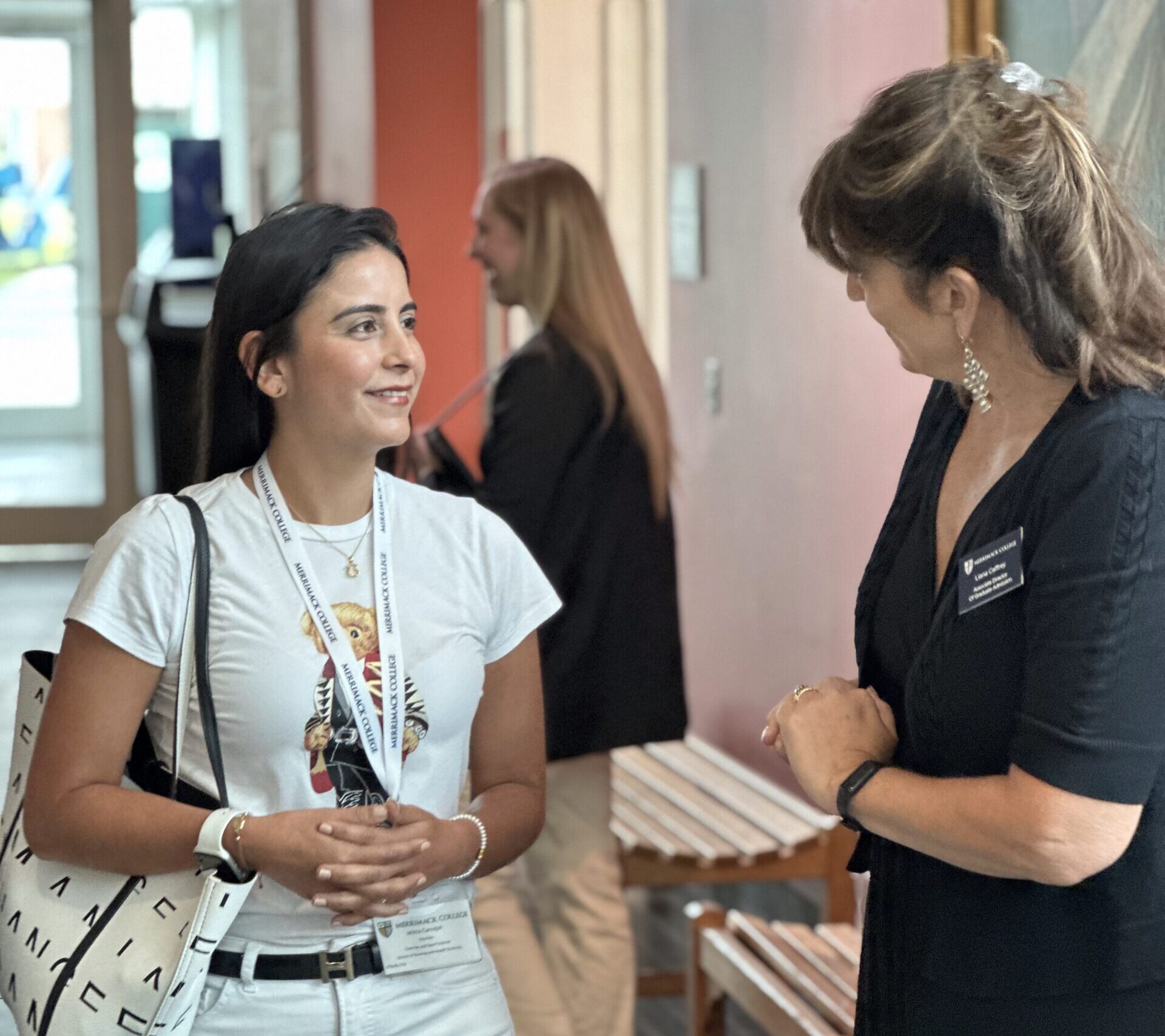 Student speaking with an admission representative