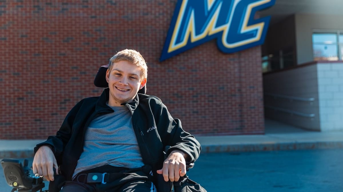 Photo of Kyler Quelch outside Lawler Rink.