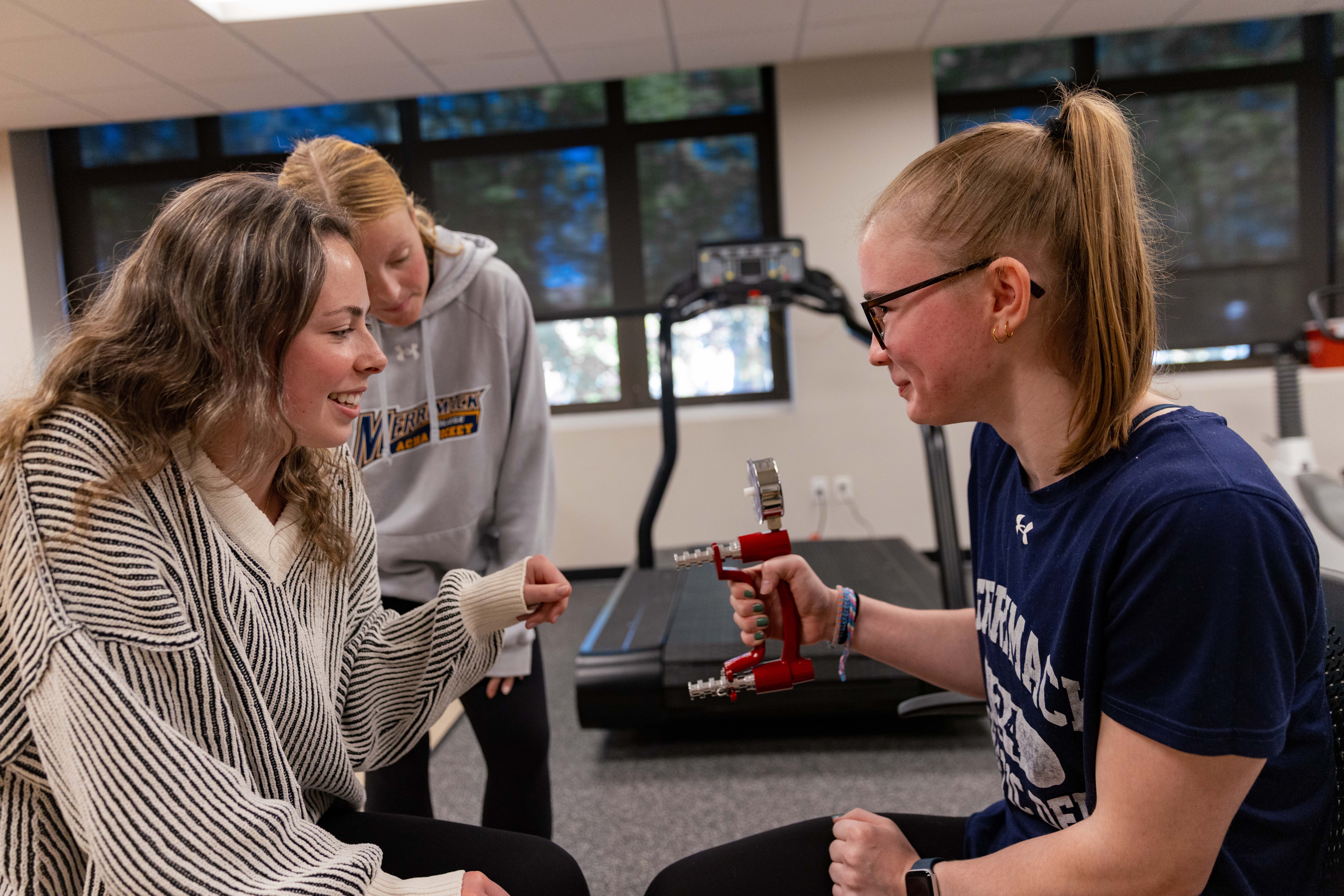 Students practicing strength testing