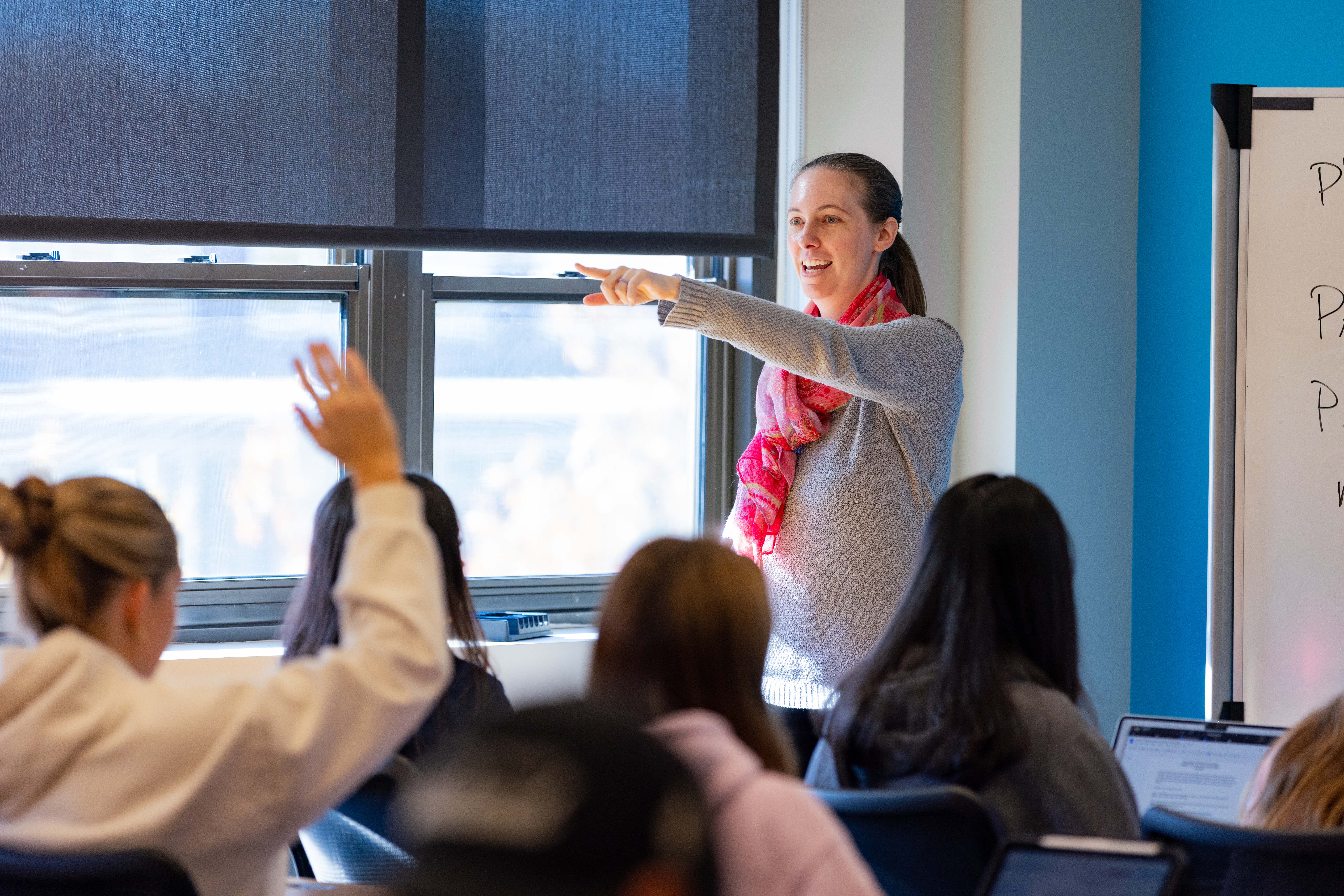 Amy shafrir instructing her class