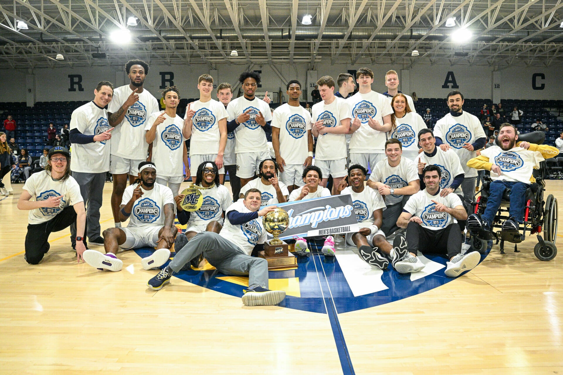 Group photo of the Merrimack College Men’s Basketball team.