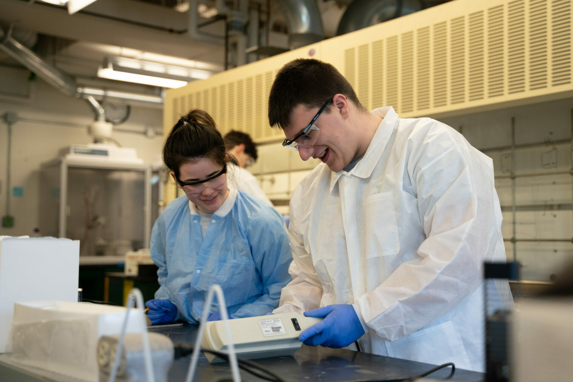 Students working together in Chemistry labs.