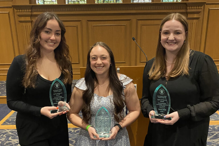 Honors Program Senior Recognition Dinner students posing with their awards