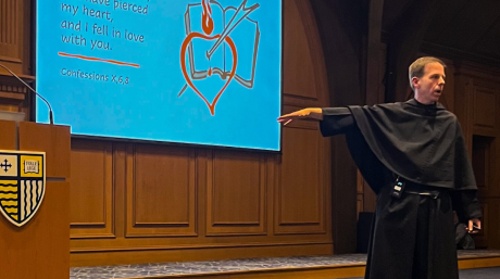 Photo of Fr. Kevin DePrinzio, O.S.A., speaking at the Collegiate Church of Christ the Teacher.