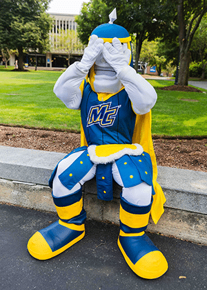Merrimack mascot covering his eyes