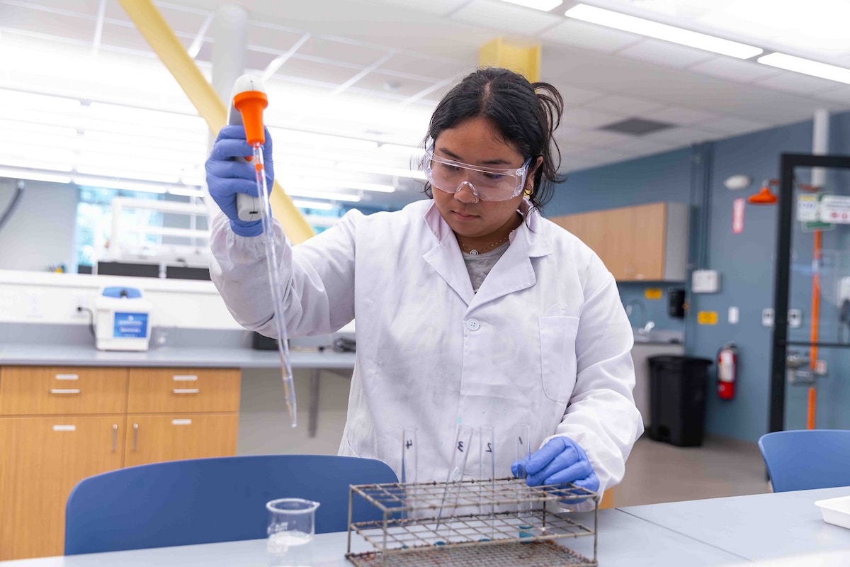 Scientist measuring for experiment