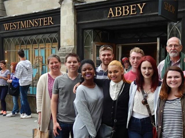 Merrimack students standing in front of Westminster Abbey Shop